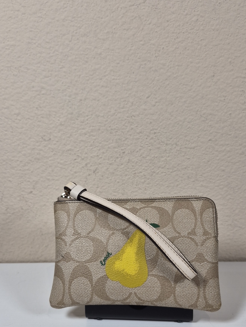 Coach Corner Zip Wristlet In Signature Canvas With Pear